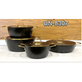ست 8 پارچه بدنه مشکی درب فلت طلایی یونیک مدل UN8307